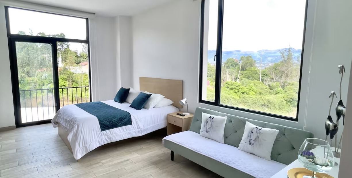 Bedroom with lounge, mountain view